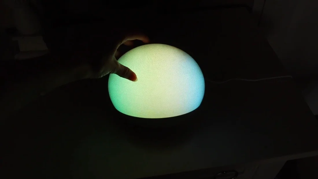 The same dome in green. The light is diffused through the shell, not pointed at you.